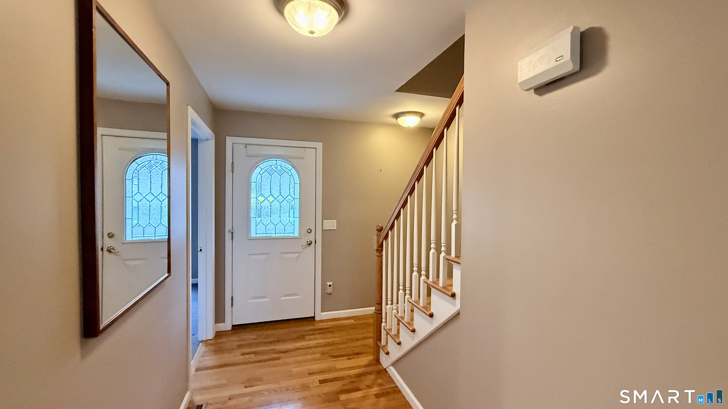 55 Nina's Way, Unit 55 Manchester, CT 06040 - Photo 2 of 25 a view of entryway with wooden floor