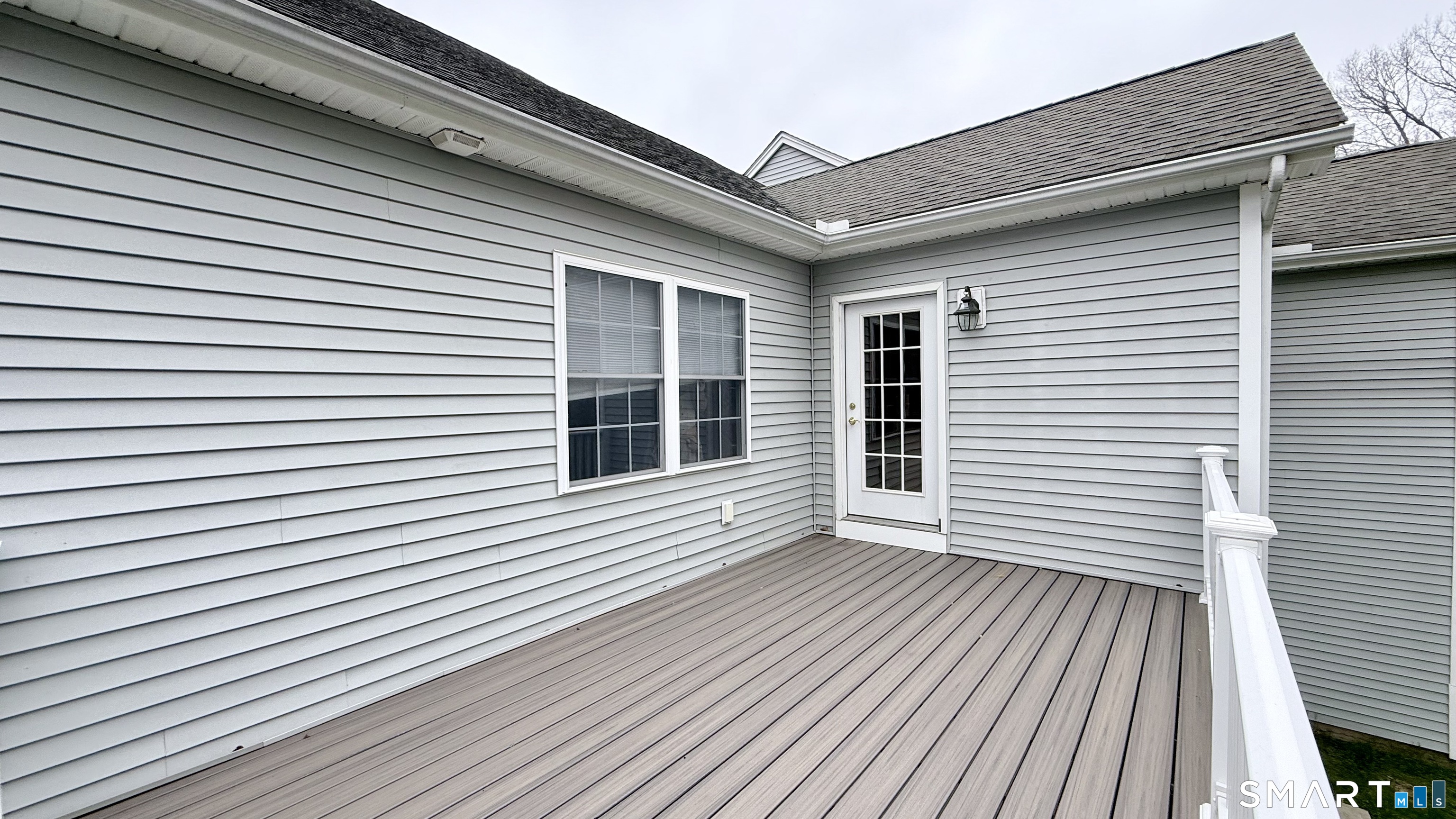 55 Nina's Way, Unit 55 Manchester, CT 06040 - Photo 22 of 25 a view of a house with wooden deck