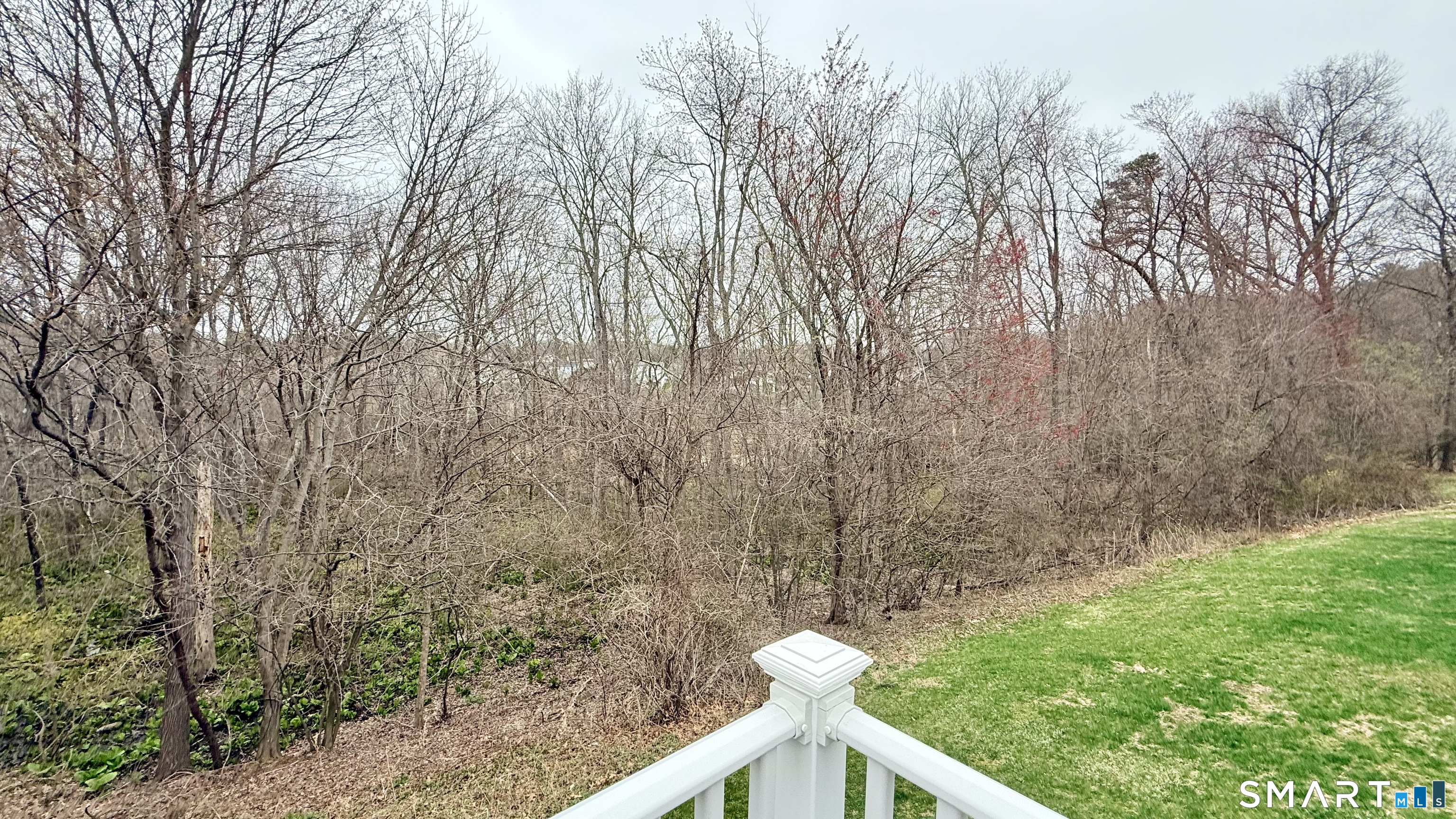 55 Nina's Way, Unit 55 Manchester, CT 06040 - Photo 24 of 25 a view of a yard from a roof deck