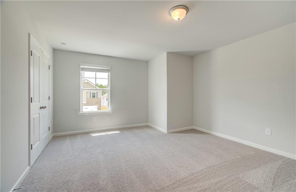 117 Alpine Road Fairburn, GA 30213 - Photo 18 of 29 a view of an empty room with a window