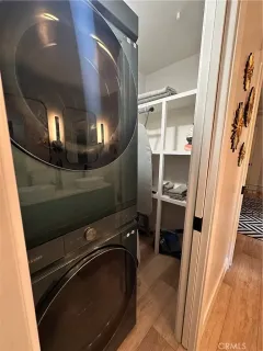 a view of a hallway with washer and dryer