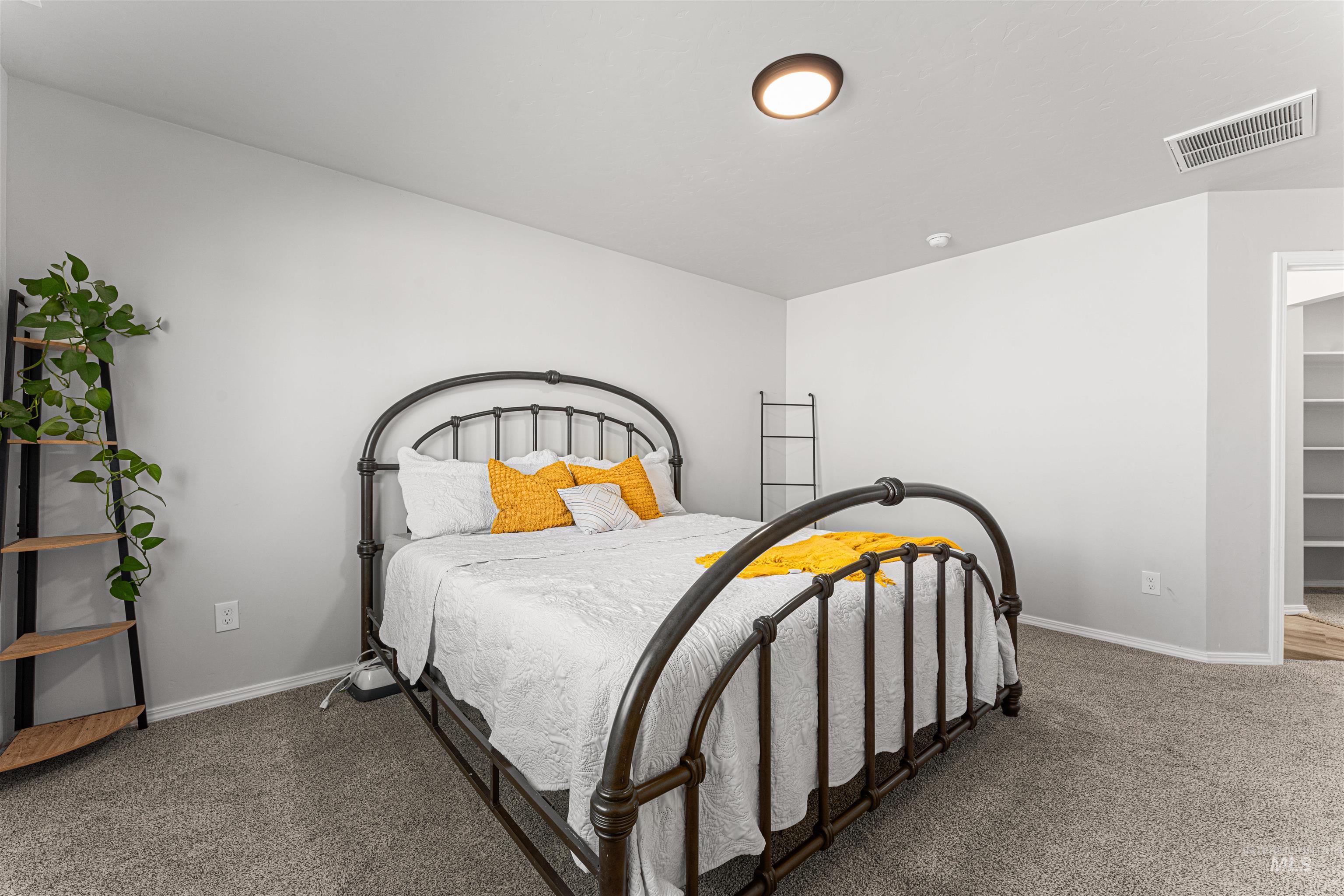 12342 Noreen Street Caldwell, ID 83607 - Photo 25 of 42 Carpeted bedroom with baseboards
