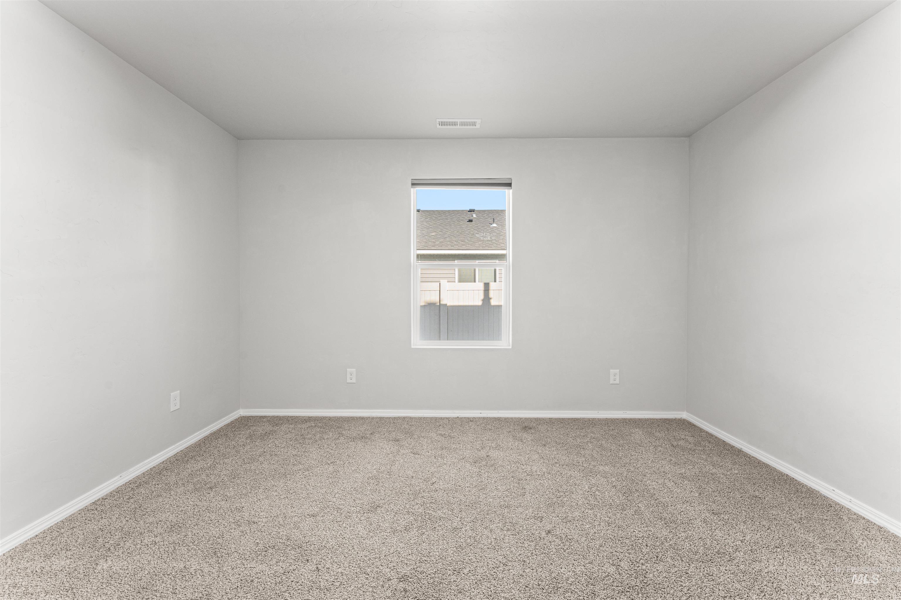 12342 Noreen Street Caldwell, ID 83607 - Photo 36 of 42 Carpeted empty room with baseboards