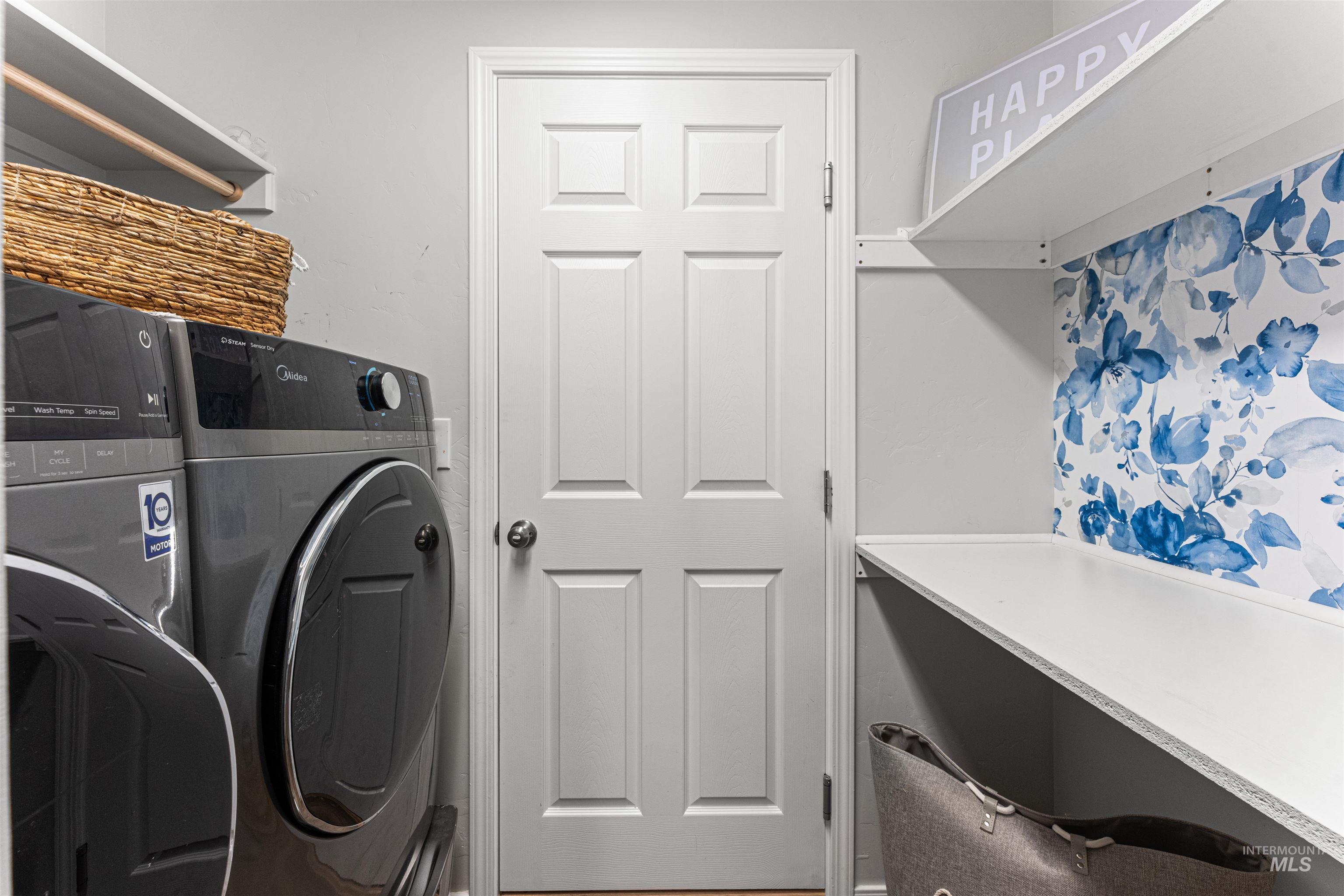 12342 Noreen Street Caldwell, ID 83607 - Photo 41 of 42 Laundry room featuring washer and clothes dryer