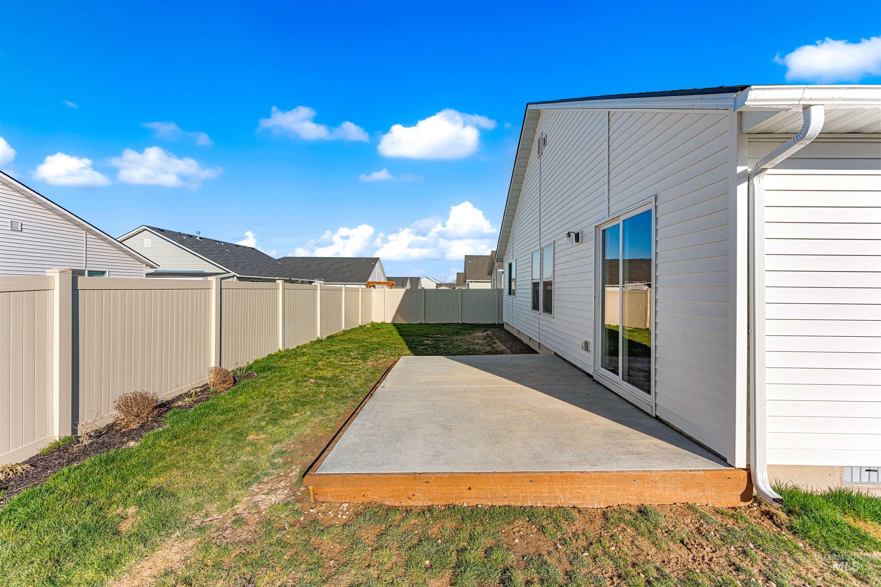 12342 Noreen Street Caldwell, ID 83607 - Photo 5 of 42 Fenced backyard featuring a patio area