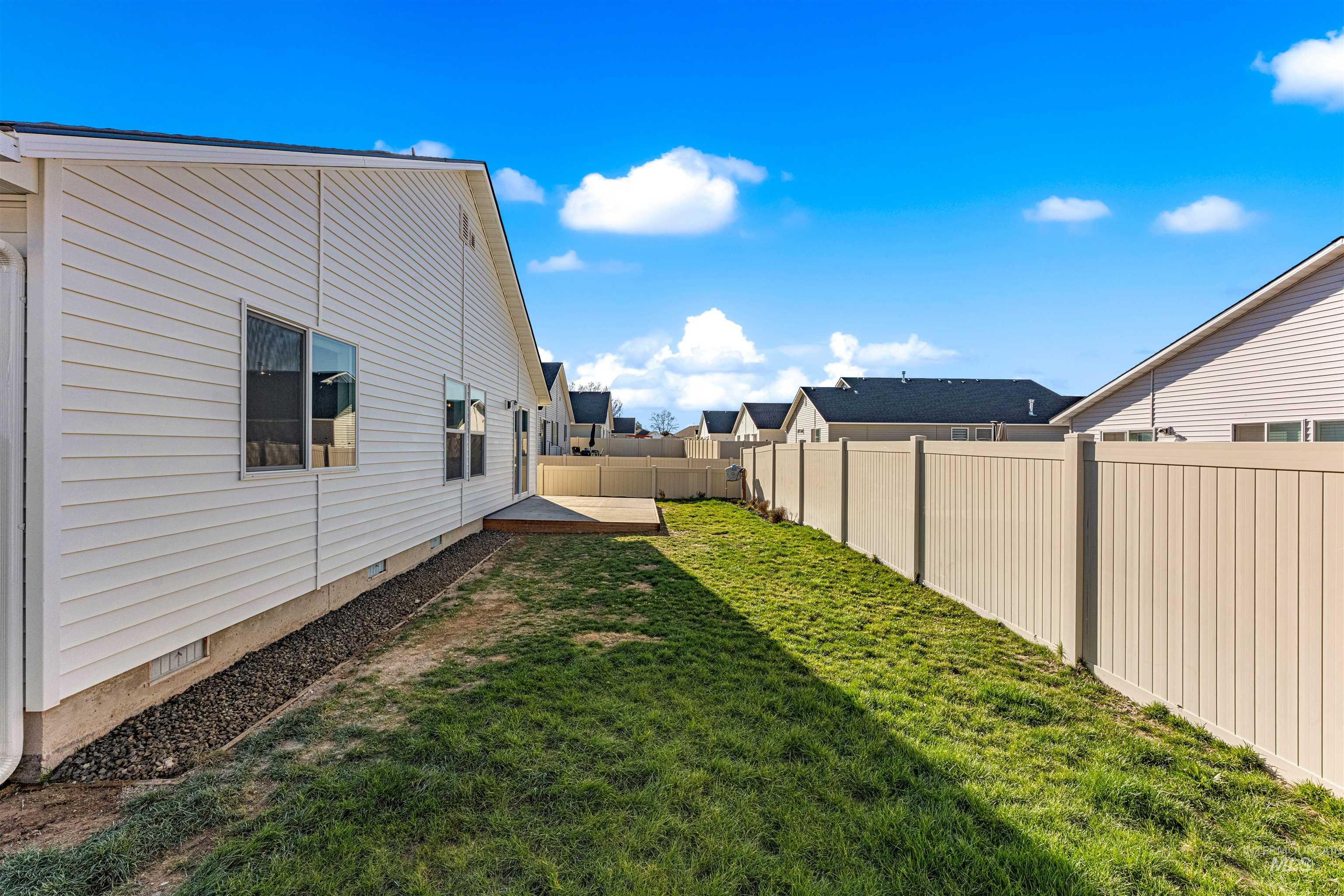12342 Noreen Street Caldwell, ID 83607 - Photo 8 of 42 Fenced backyard with a residential view