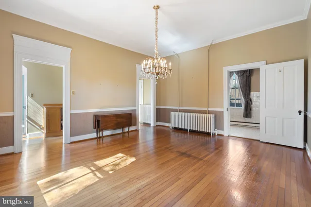 a view of a livingroom with furniture and a fireplace