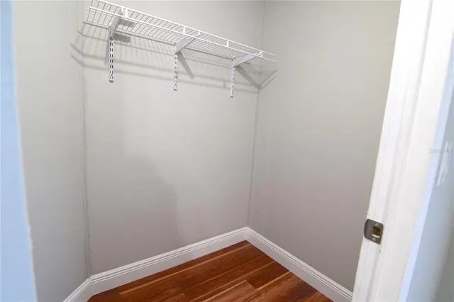 a view of a room with racks on the wall