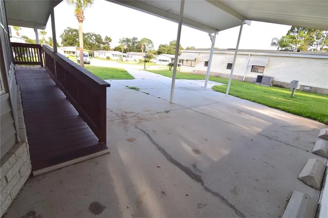 an outdoor view of a house with outdoor space