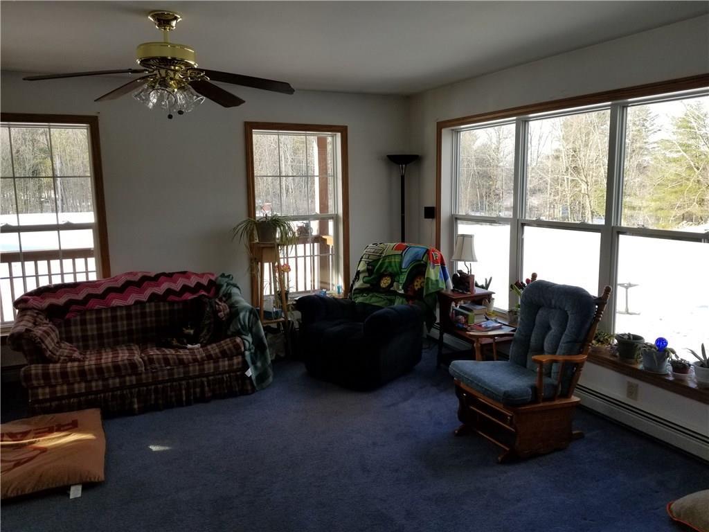 1008 Station Road Hebron, ME 04238 - Photo 10 of 16 Large living room encompasses the...
