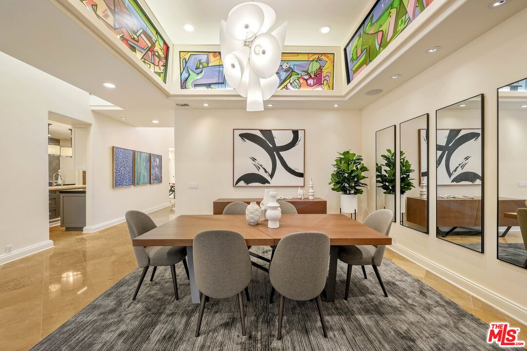2305 Canyonback Road Los Angeles, CA 90049 - Photo 3 of 50 a view of a dining room with furniture window and wooden floor
