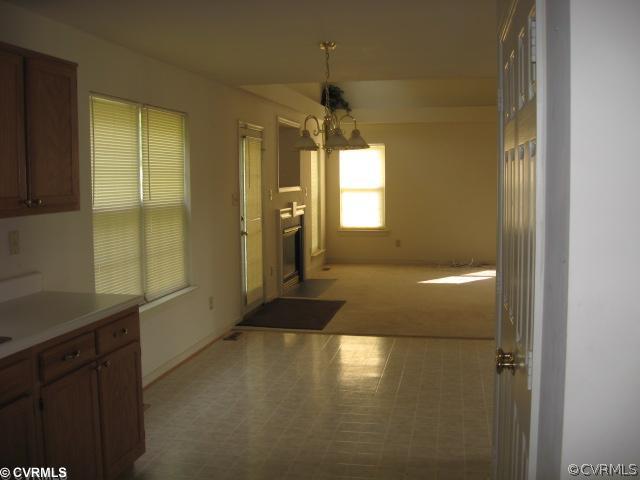 1416 Tree Ridge Road Richmond, VA 23231 - Photo 3 of 5 a view of a hallway with windows