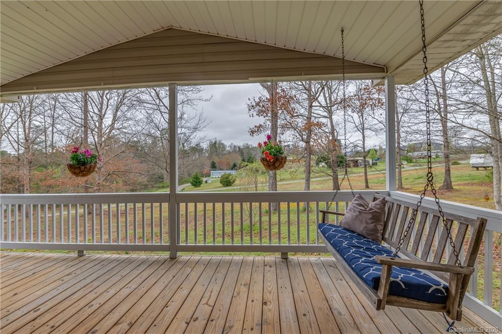526 Parris Road Rutherfordton, NC 28139 - Photo 2 of 27 a view of balcony with wooden floor
