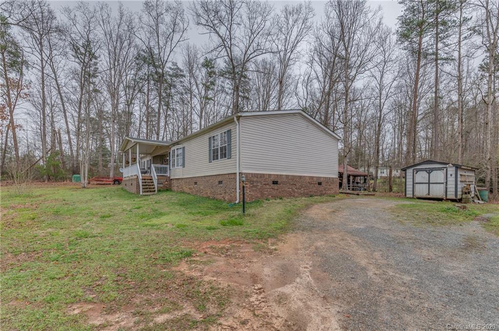 526 Parris Road Rutherfordton, NC 28139 - Photo 11 of 27 a view of a house with a yard