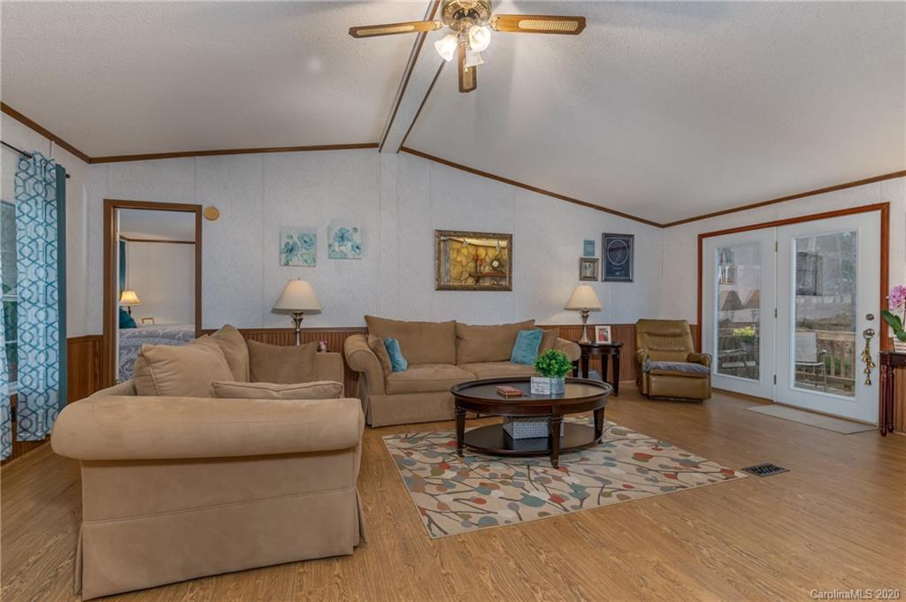 526 Parris Road Rutherfordton, NC 28139 - Photo 12 of 27 a living room with furniture and wooden floor