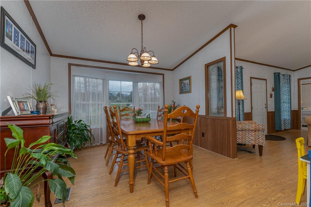 526 Parris Road Rutherfordton, NC 28139 - Photo 22 of 27 a view of a dining room with furniture window and outside view