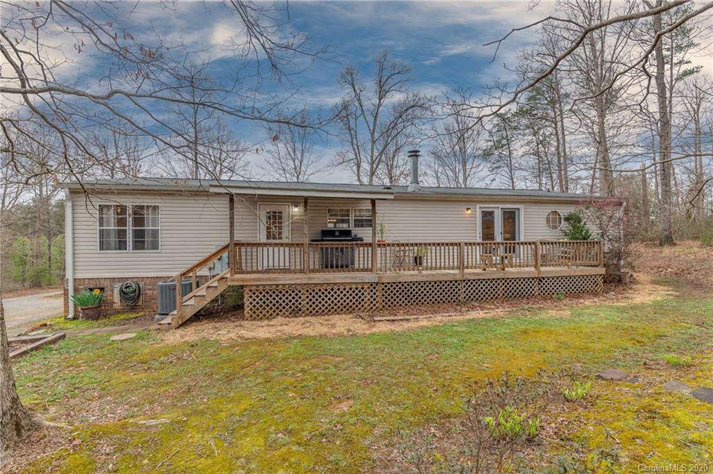 526 Parris Road Rutherfordton, NC 28139 - Photo 10 of 27 a front view of house with yard and swimming pool