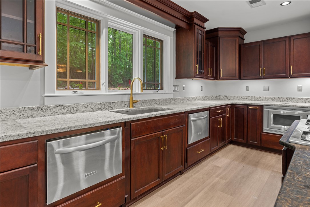 309 Woodland Way Clemson, SC 29631 - Photo 7 of 43 This thoughtfully designed kitchen provides ample space for culinary exploration.