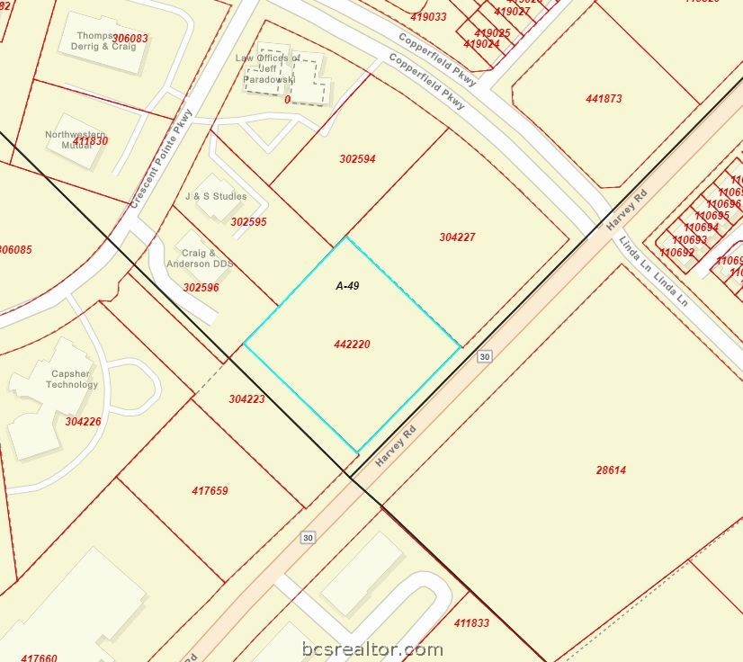 3305 Harvey Road College Station, TX 77845 - Photo 5 of 6 workspace with white cabinets and wooden floor