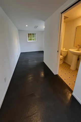 a view of a patio with table and chairs potted plants