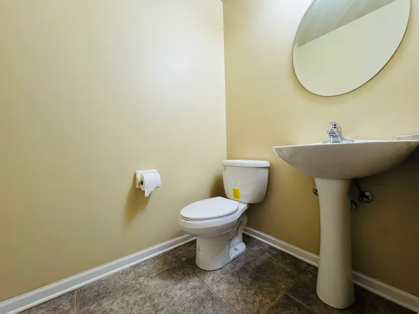 a bathroom with a sink and a toilet