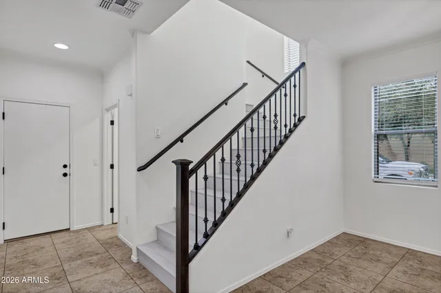 a view of a hallway with entryway