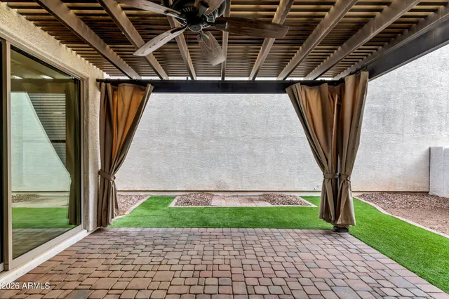 a view of a porch with a yard