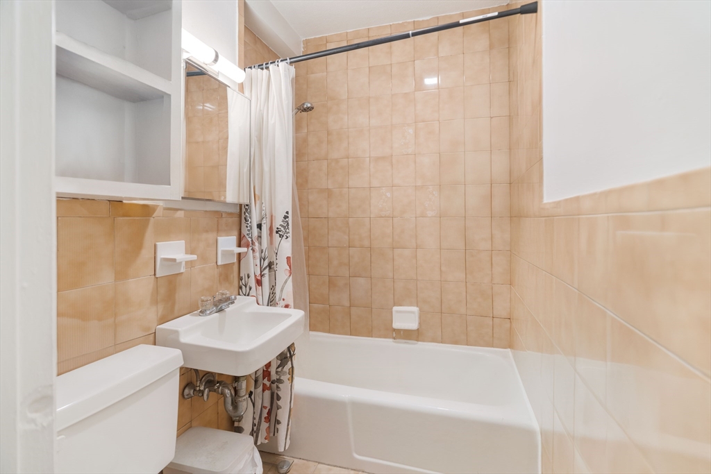 5 North Margin Street, Unit 10 Boston, MA 02113 - Photo 5 of 14 a bathroom with a sink and a bathtub