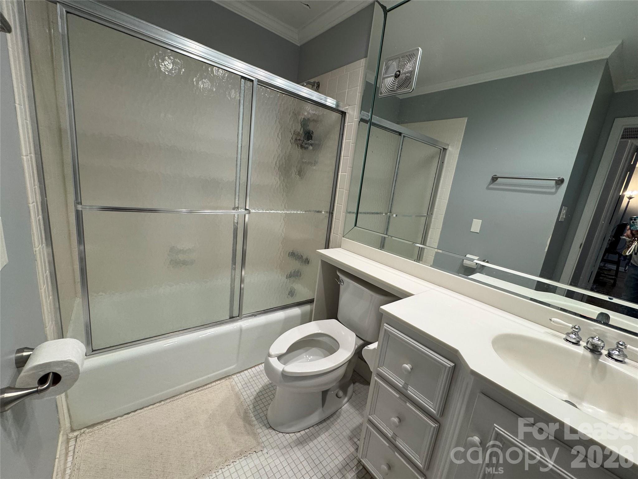 1323 Queens Road, Unit 303 Charlotte, NC 28207 - Photo 13 of 47 a bathroom with a sink toilet and shower
