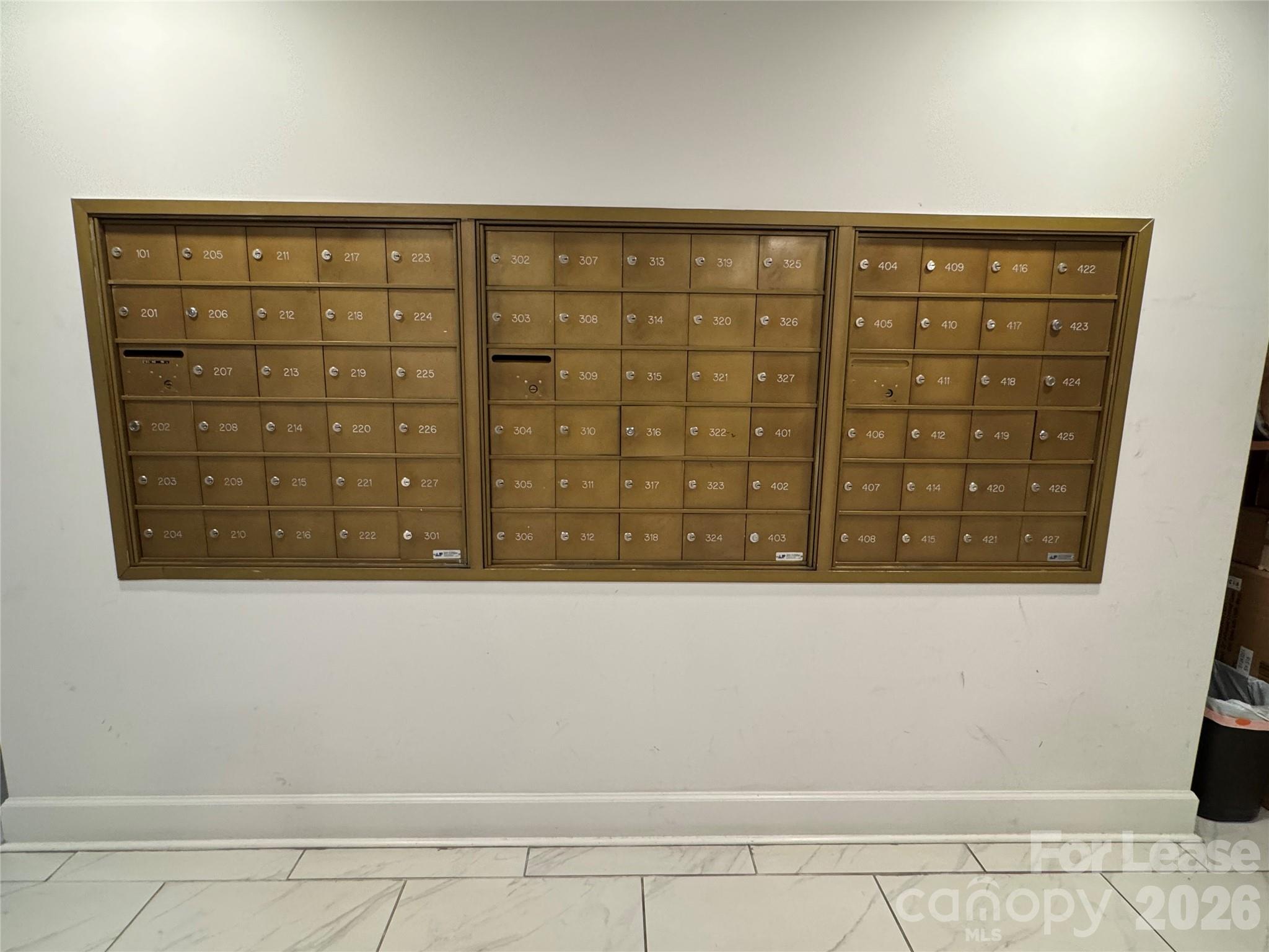 1323 Queens Road, Unit 303 Charlotte, NC 28207 - Photo 24 of 47 a view of a door with wooden floor