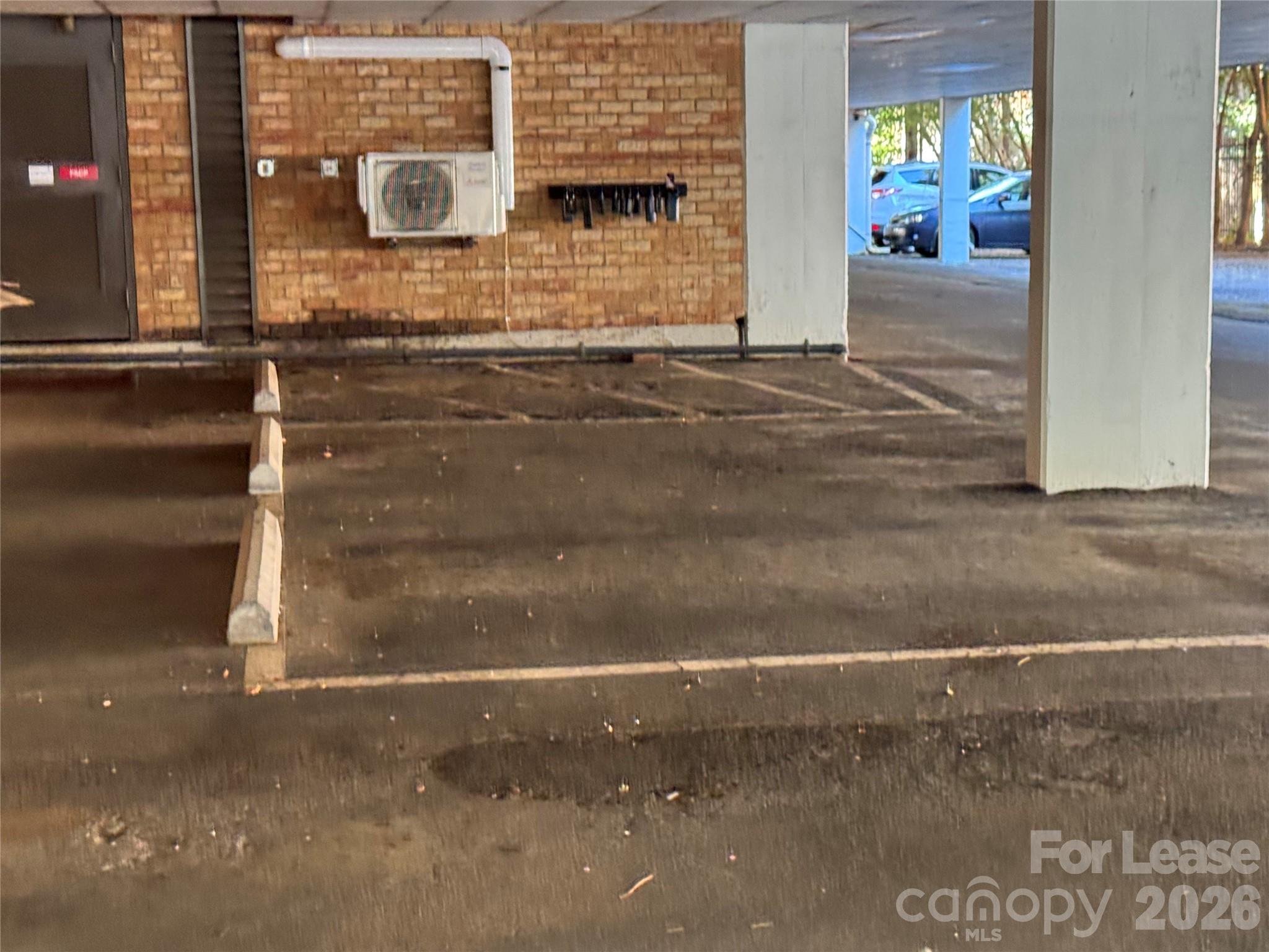 1323 Queens Road, Unit 303 Charlotte, NC 28207 - Photo 45 of 47 a view of car garage