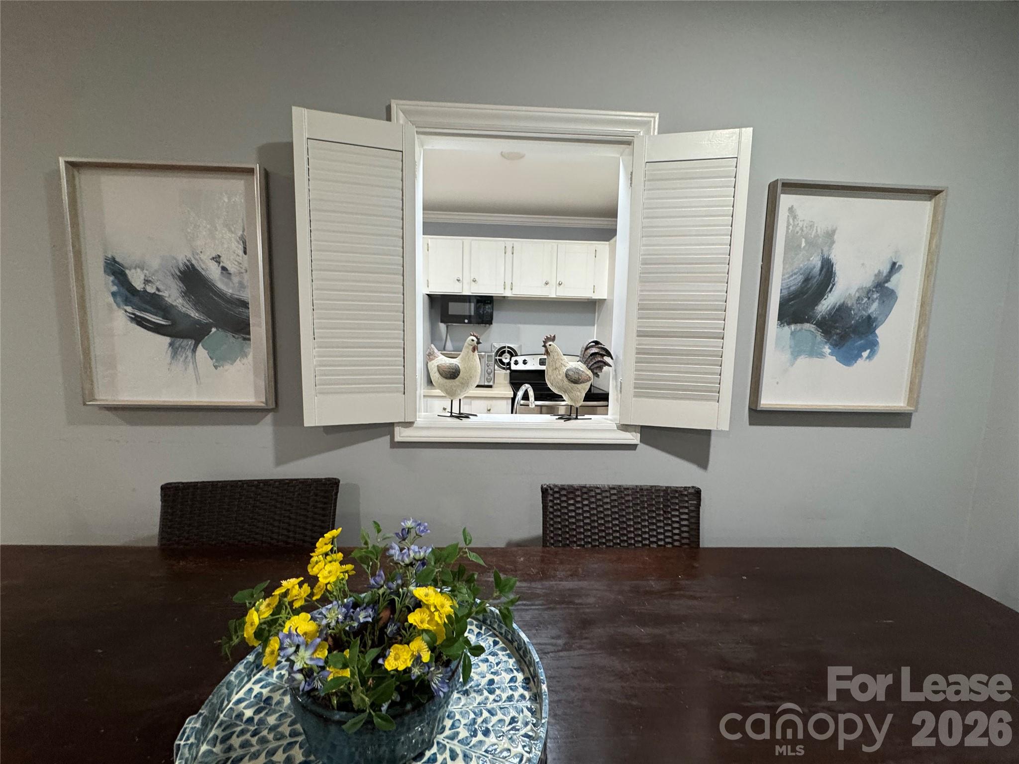 1323 Queens Road, Unit 303 Charlotte, NC 28207 - Photo 7 of 47 a living room with furniture and a painting on the wall