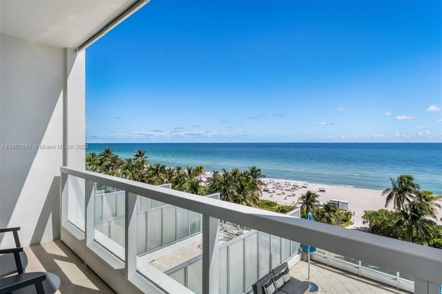 a view of a kitchen with a sink
