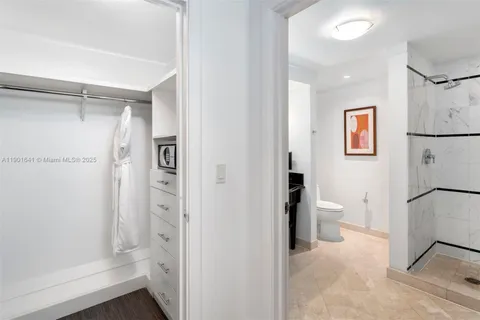 a group of people sitting at tables in a patio