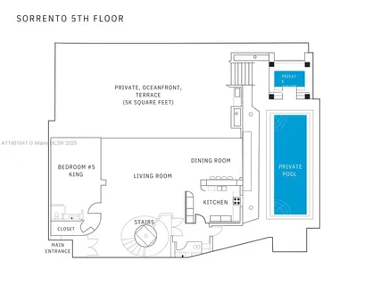 a front view of a building with a garden