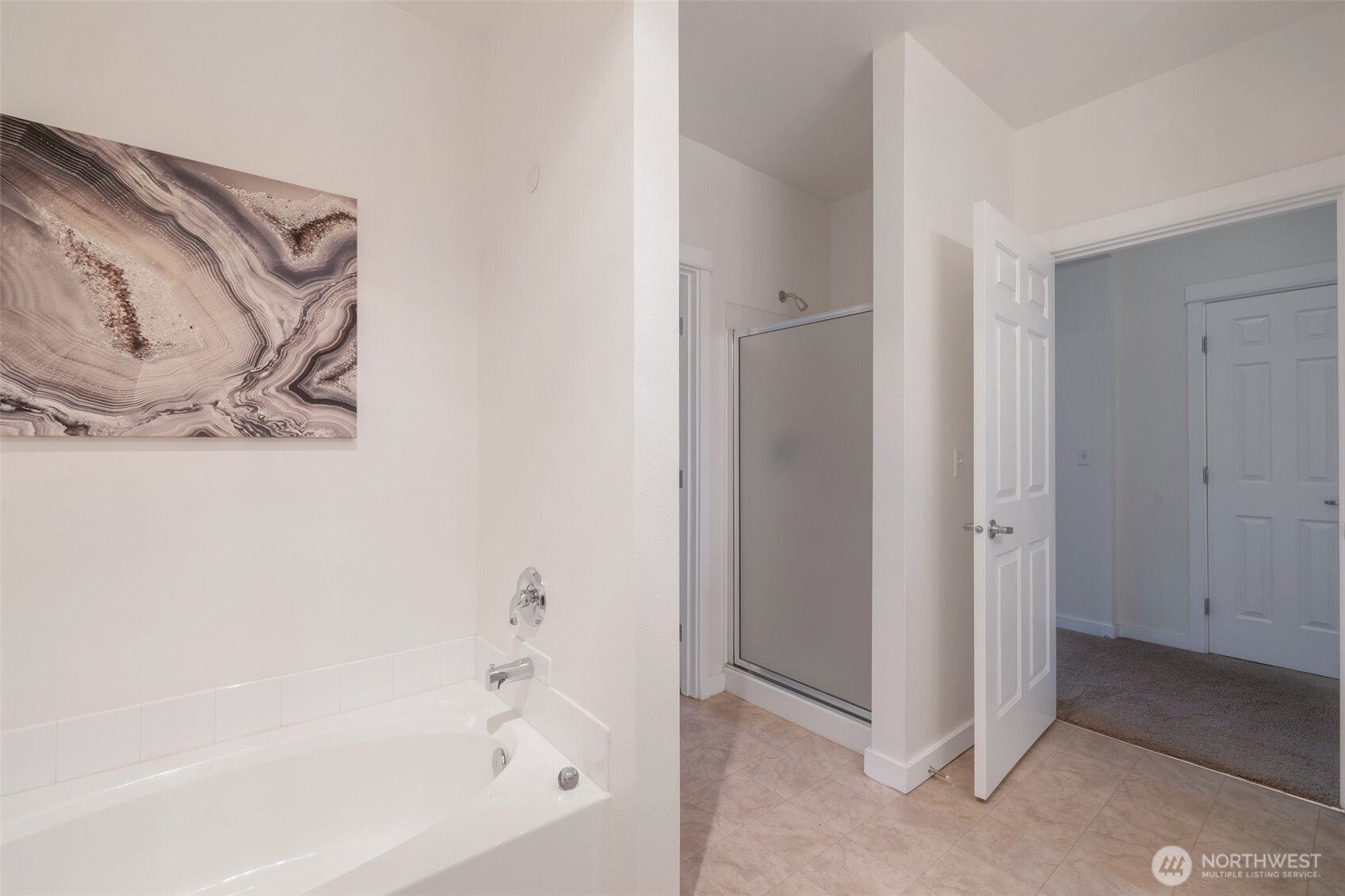 13301 Southeast 79th Place, Unit B402 Newcastle, WA 98059 - Photo 16 of 25 a bathroom with a bathtub and a shower