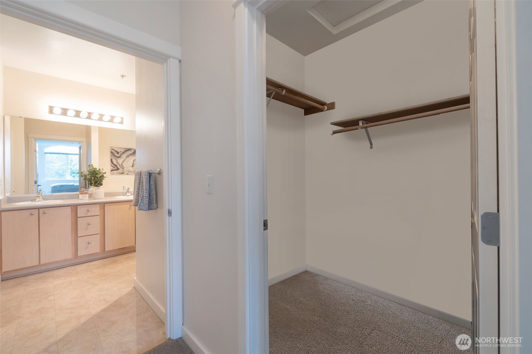 13301 Southeast 79th Place, Unit B402 Newcastle, WA 98059 - Photo 17 of 25 a view of a bathroom with a shower and a sink