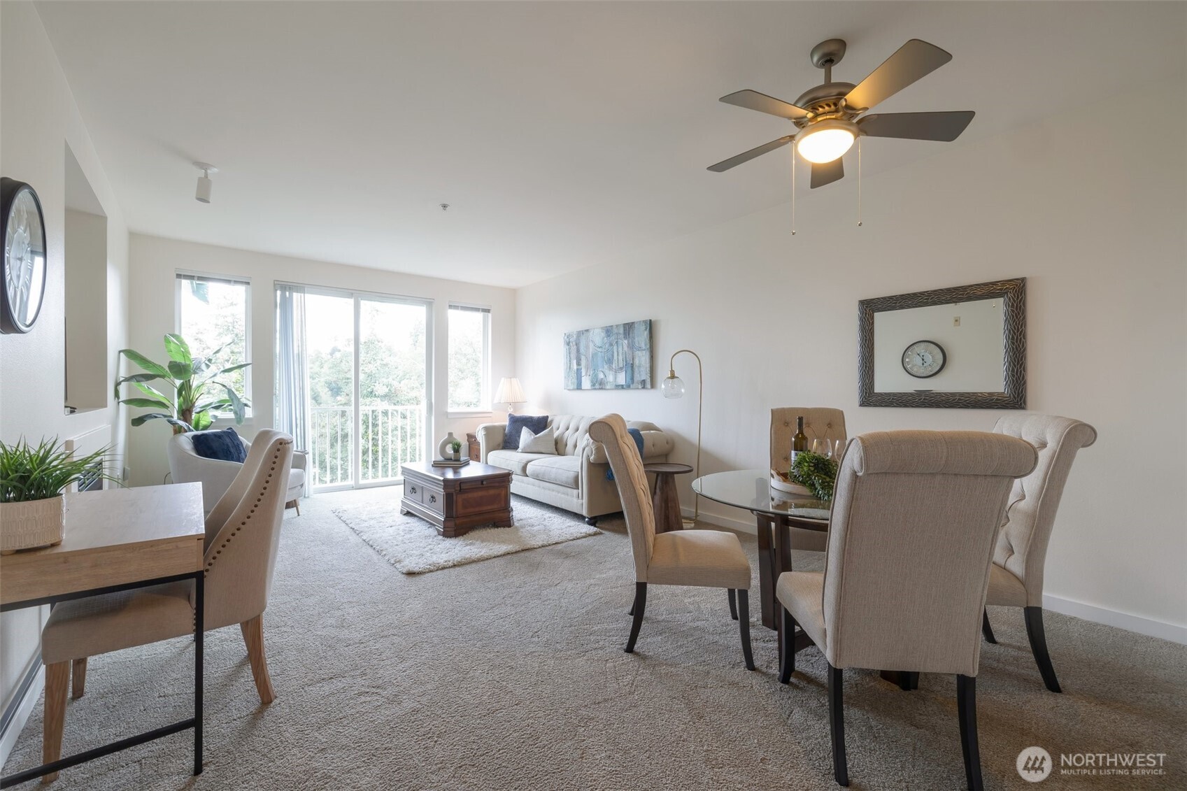 13301 Southeast 79th Place, Unit B402 Newcastle, WA 98059 - Photo 5 of 25 a living room with furniture and a large window