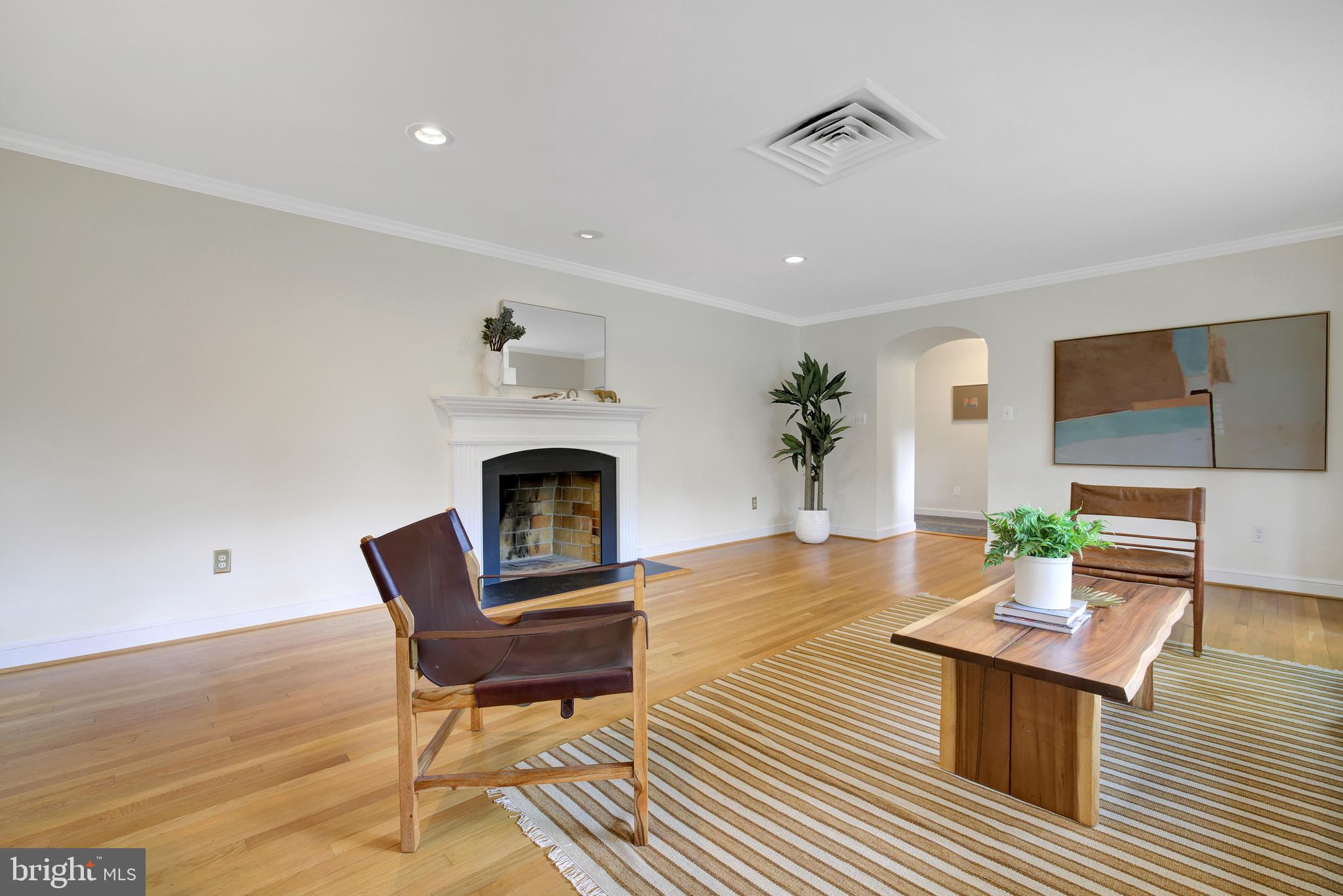 9801 Old Spring Road Kensington, MD 20895 - Photo 9 of 38 Living room with wood burning fireplace