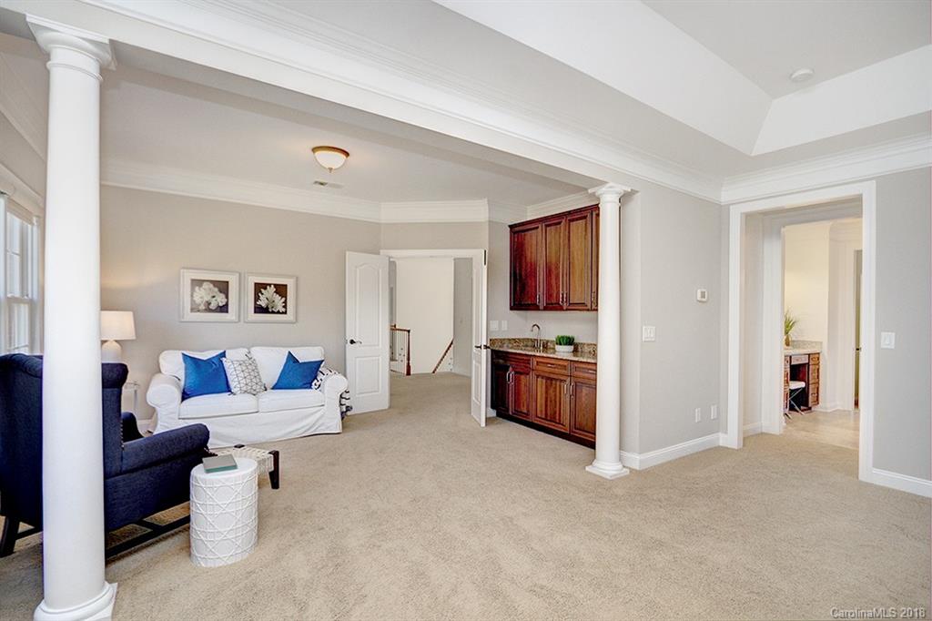 2511 Sharon Road Charlotte, NC 28211 - Photo 14 of 27 a living room with furniture and a flat screen tv