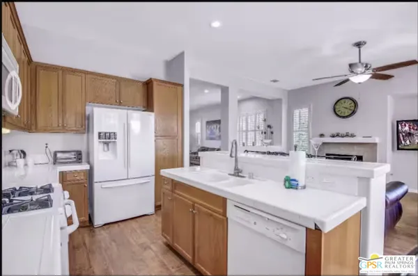 a view of a dining room with furniture and window