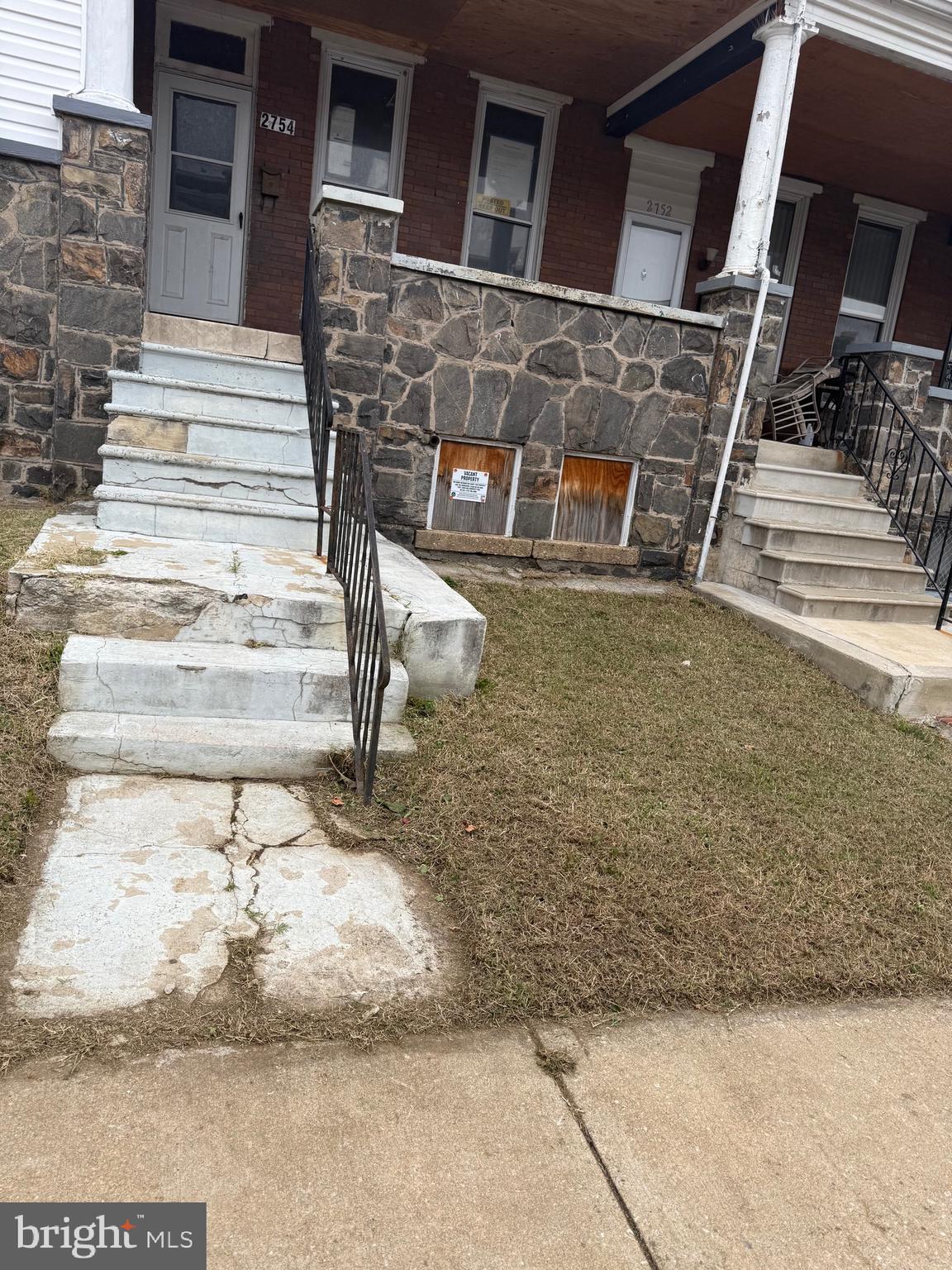 2754 Riggs Avenue Baltimore, MD 21216 - Photo 3 of 13 a view of parking area of the house