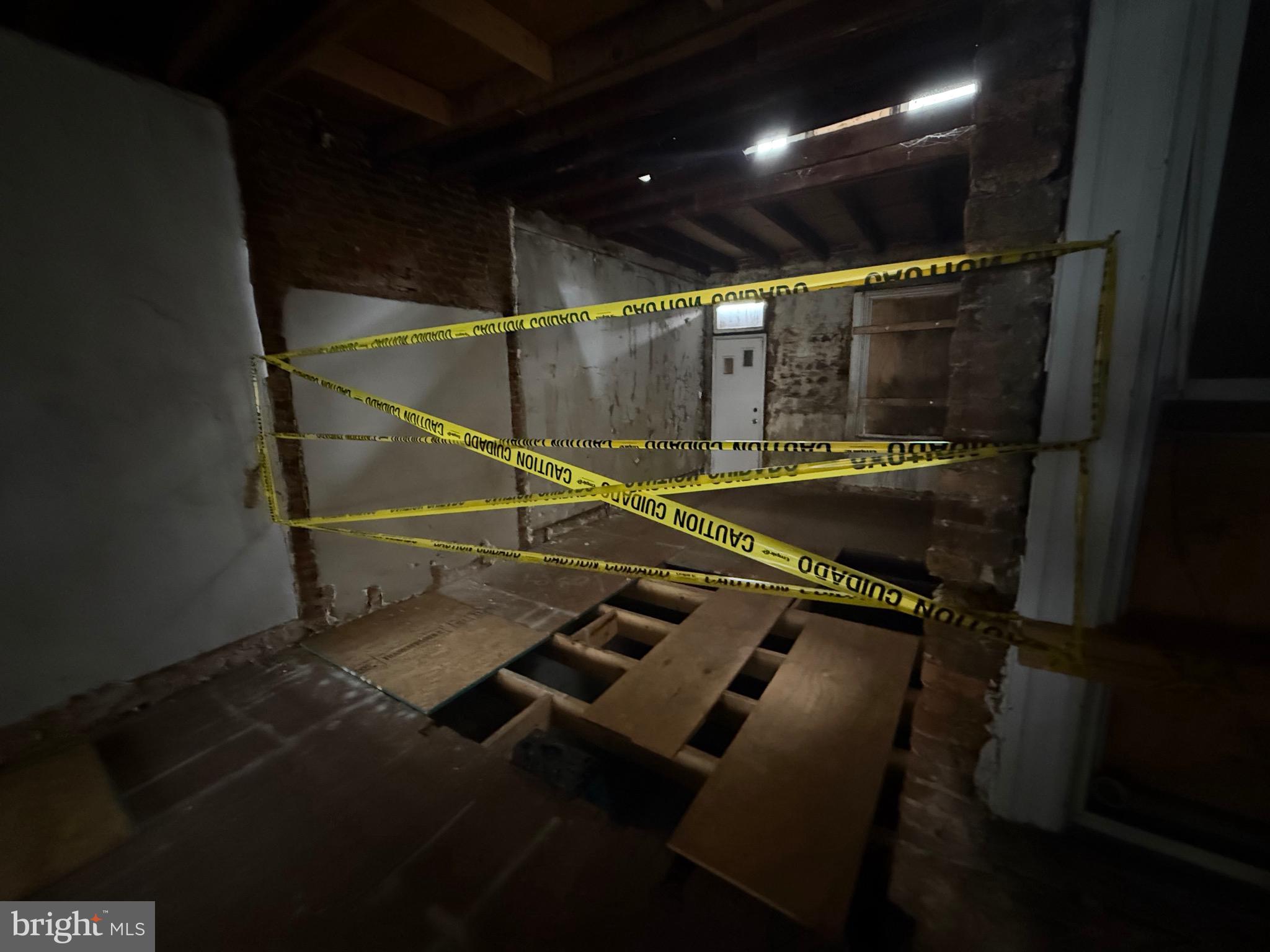 2754 Riggs Avenue Baltimore, MD 21216 - Photo 7 of 13 a room with gym equipment