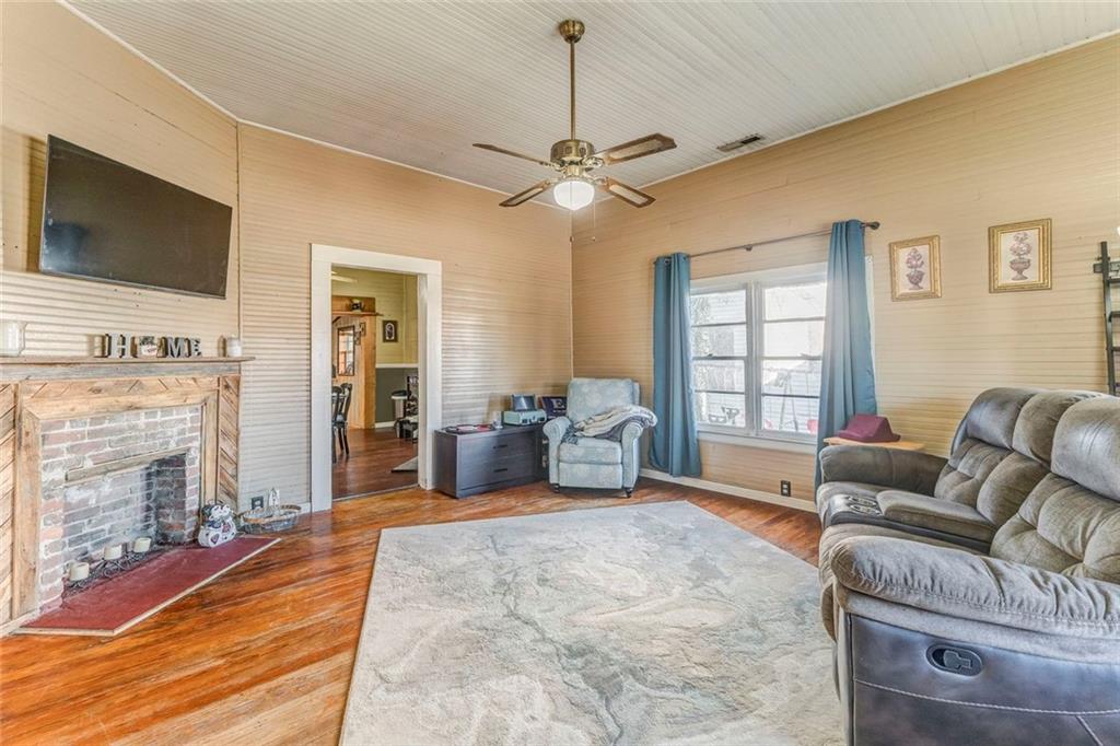 30 Oak Street Aragon, GA 30104 - Photo 11 of 38 a living room with furniture and a flat screen tv