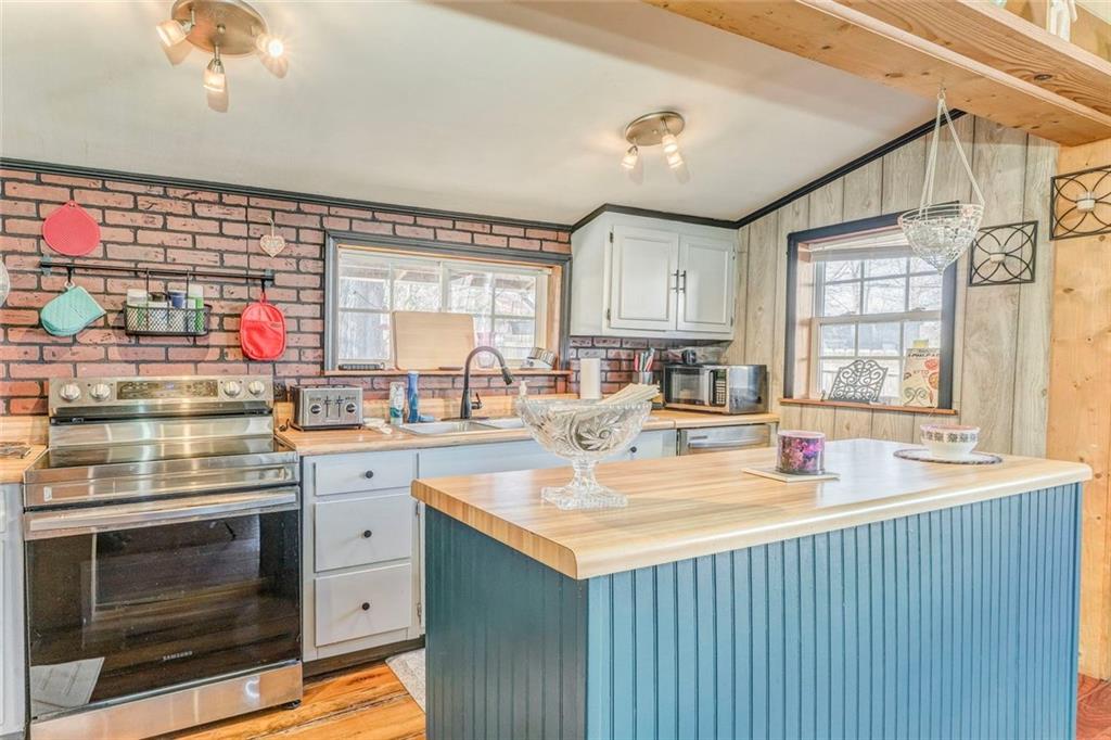 30 Oak Street Aragon, GA 30104 - Photo 17 of 38 a kitchen with a sink stove and cabinets