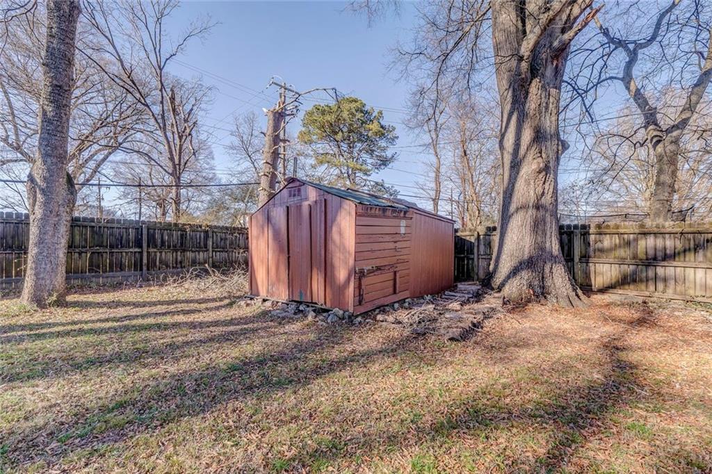 30 Oak Street Aragon, GA 30104 - Photo 37 of 38 a view of backyard with wooden fence and large trees
