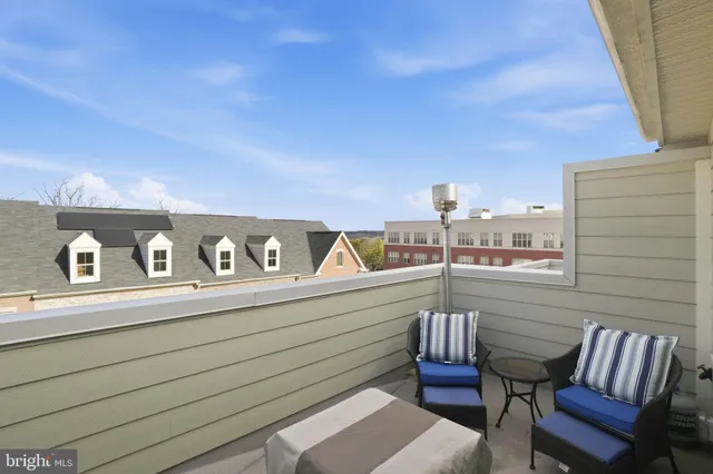 a view of a chairs in a balcony