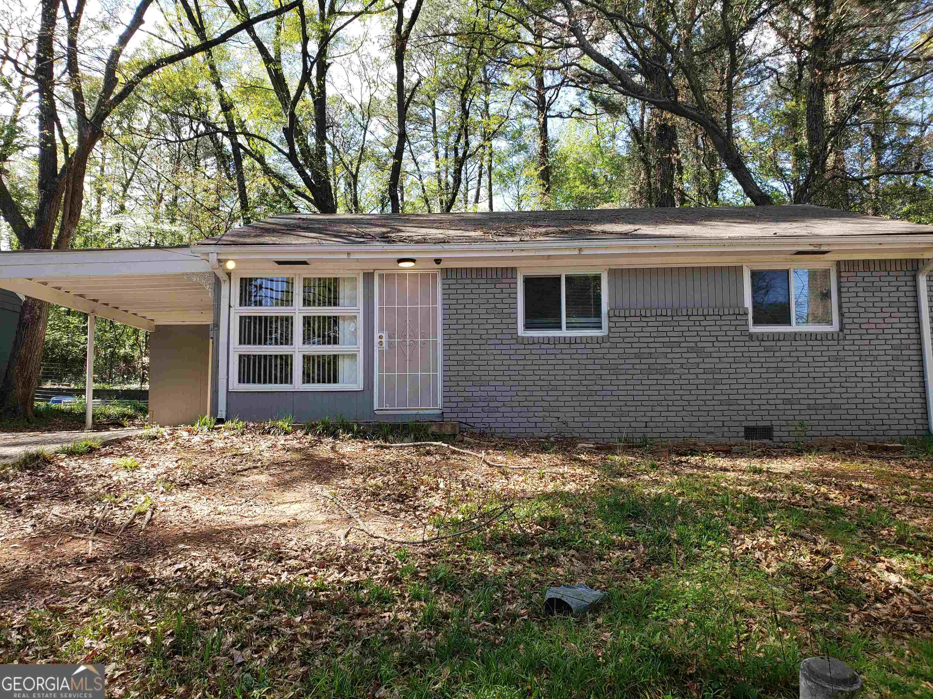 324 Fairburn Road Southwest Atlanta, GA 30331 - Photo 1 of 1 front view of a house with a yard