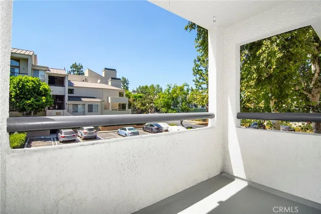 a picture of a house with a tree