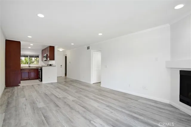 a view of kitchen with wooden floor